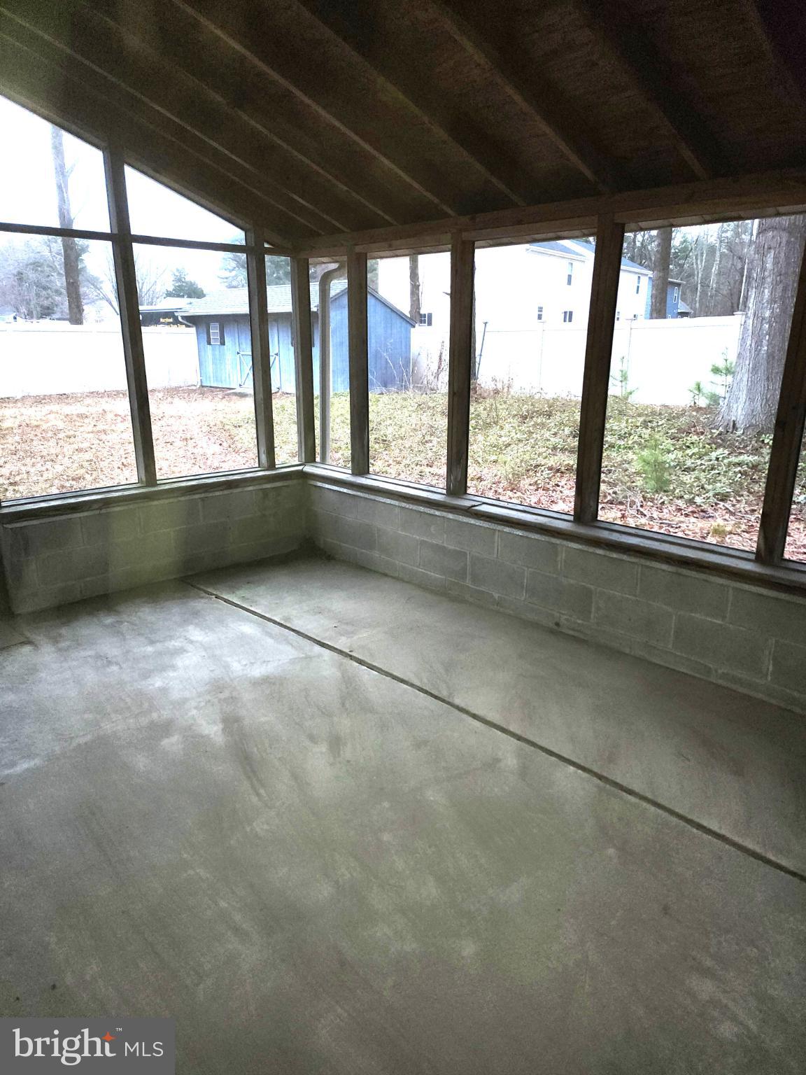 9310 Romancoke Road Stevensville, MD 21666 - Photo 9 of 35 a view of an empty room with a window