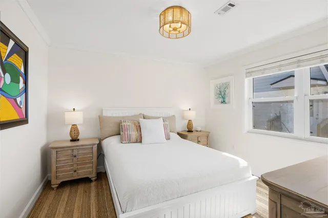 a bathroom with a granite countertop sink a mirror and a shower