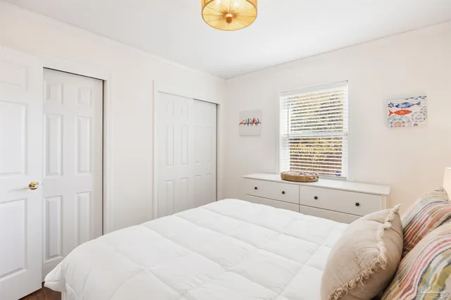 a bathroom with a shower and a mirror