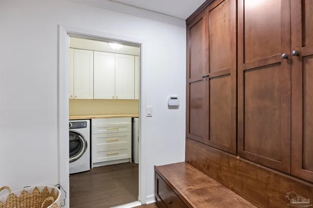 a view of a swimming pool and an outdoor seating