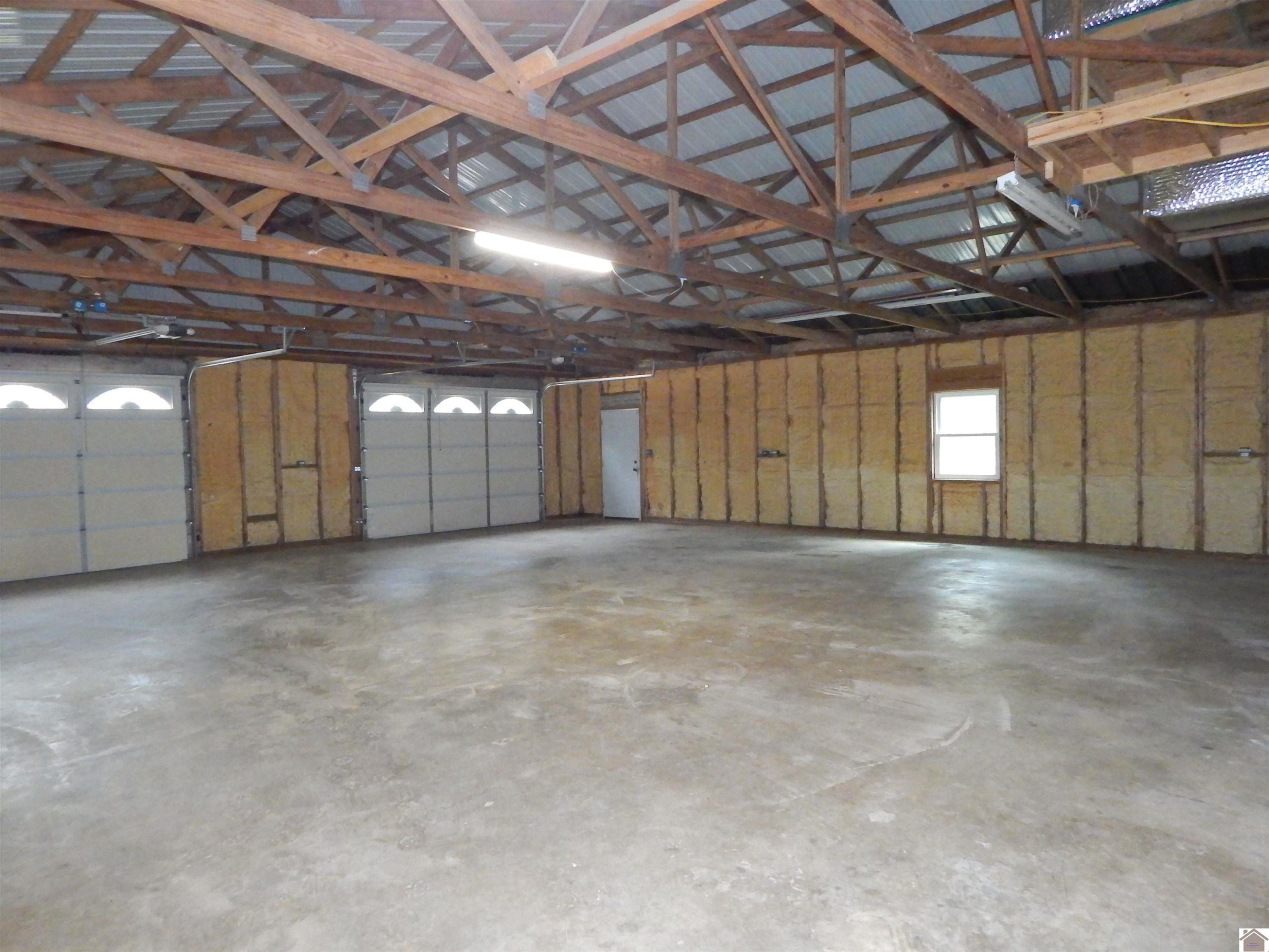 312 Belews Road Benton, KY 42025 - Photo 29 of 33 VIEW OF INSIDE HUGE ATT. GARAGE