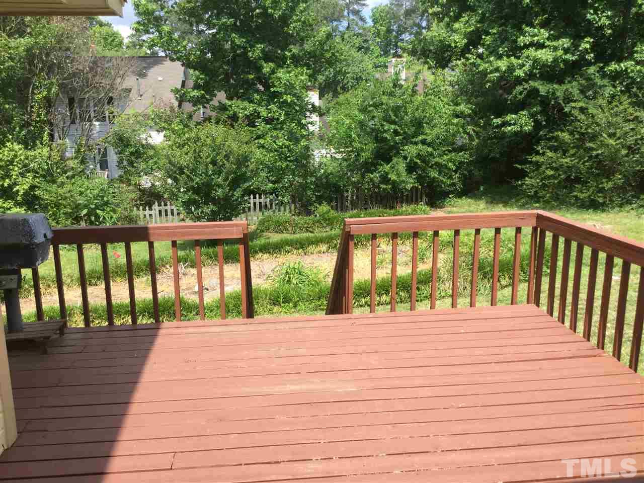 4405 Lake Ridge Drive Raleigh, NC 27604 - Photo 11 of 12 a balcony view with a garden space