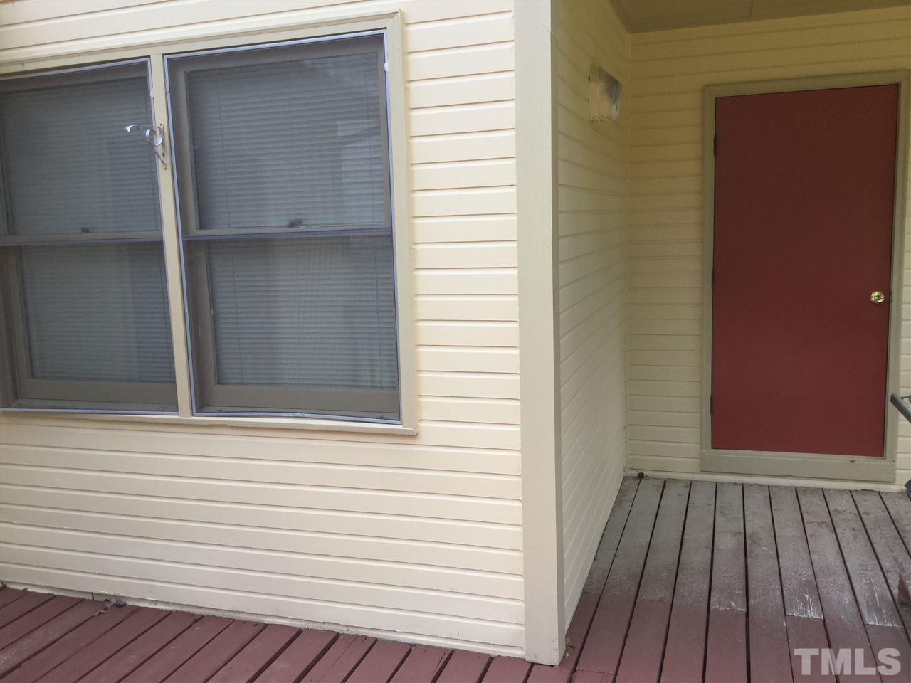4405 Lake Ridge Drive Raleigh, NC 27604 - Photo 12 of 12 a view of a balcony with wooden floor