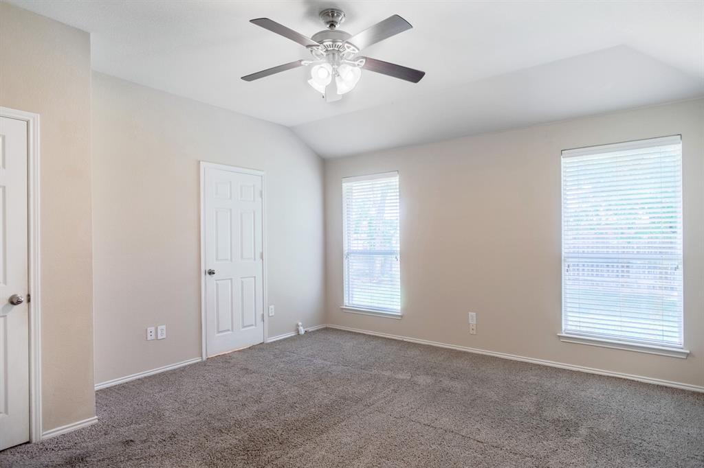 4929 Spur Ridge Court Fort Worth, TX 76244 - Photo 20 of 34 a view of an empty room with a window