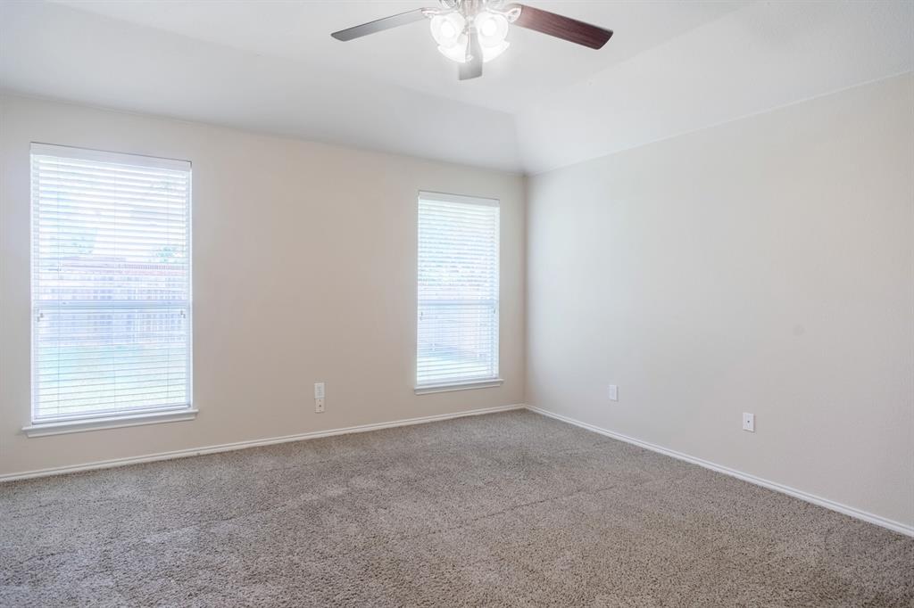4929 Spur Ridge Court Fort Worth, TX 76244 - Photo 21 of 34 a view of an empty room with a window