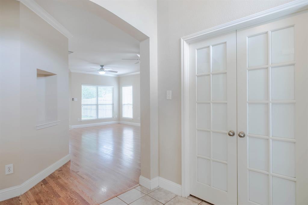 4929 Spur Ridge Court Fort Worth, TX 76244 - Photo 6 of 34 an empty room with windows