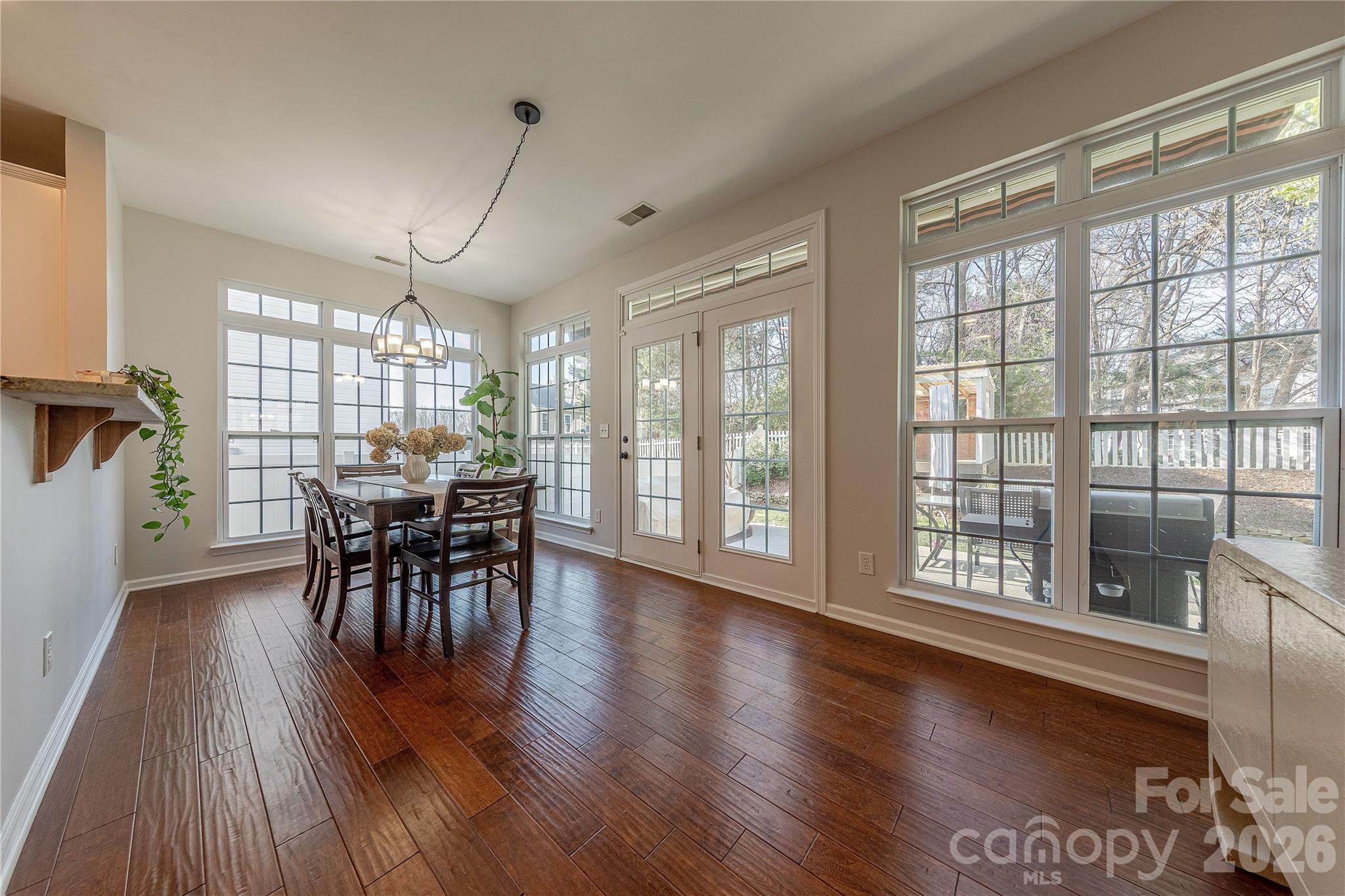 5919 Summer Fog End Fort Mill, SC 29708 - Photo 18 of 41 a view of a dining room with furniture window and wooden floor