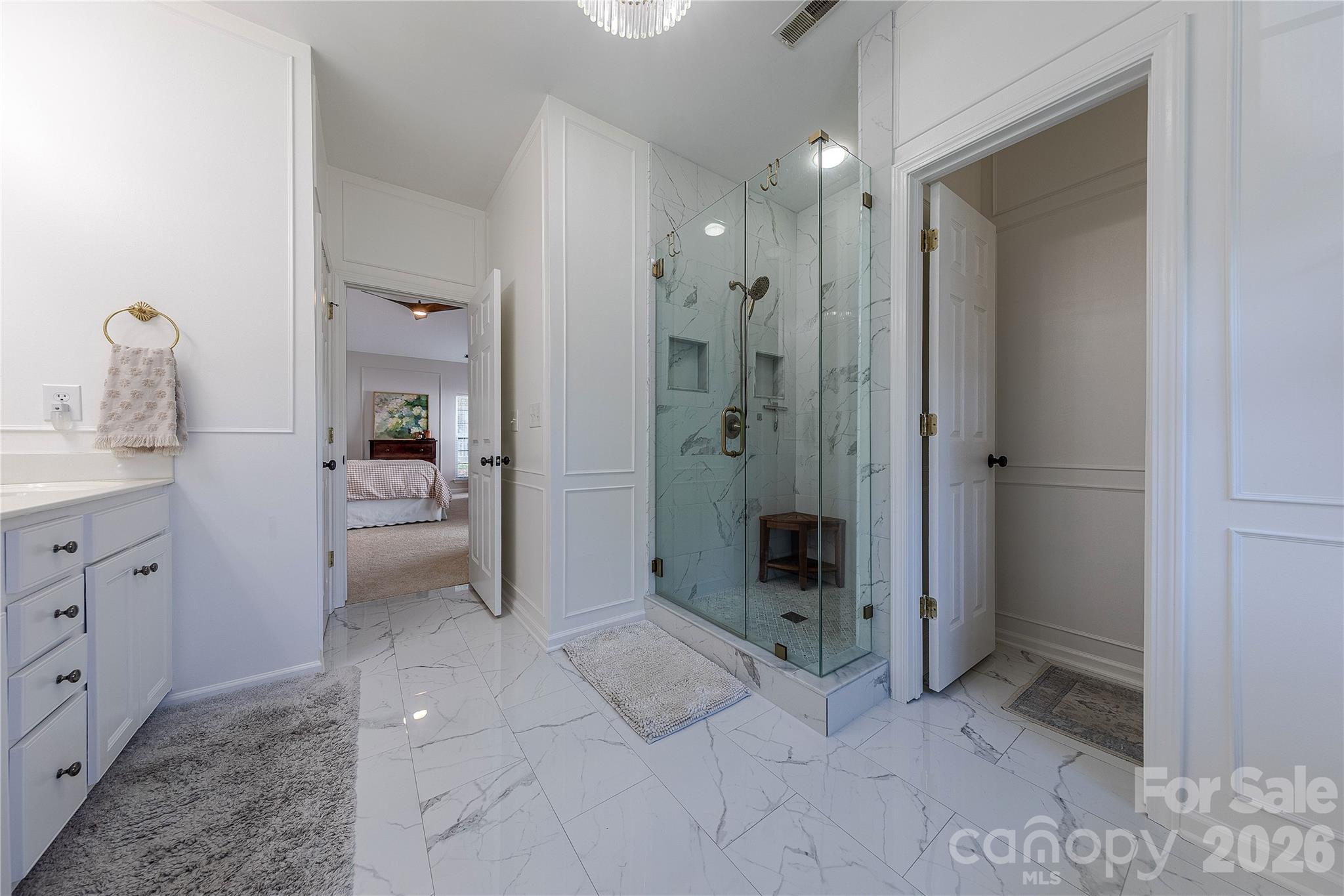 5919 Summer Fog End Fort Mill, SC 29708 - Photo 24 of 41 a bathroom with a granite countertop sink mirror and shower