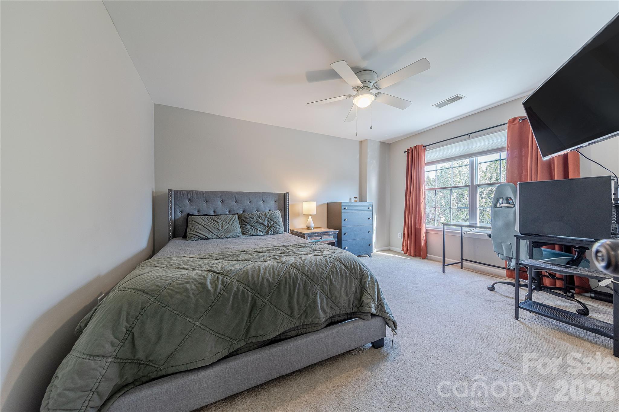 5919 Summer Fog End Fort Mill, SC 29708 - Photo 29 of 41 a bedroom with a bed and a flat screen tv