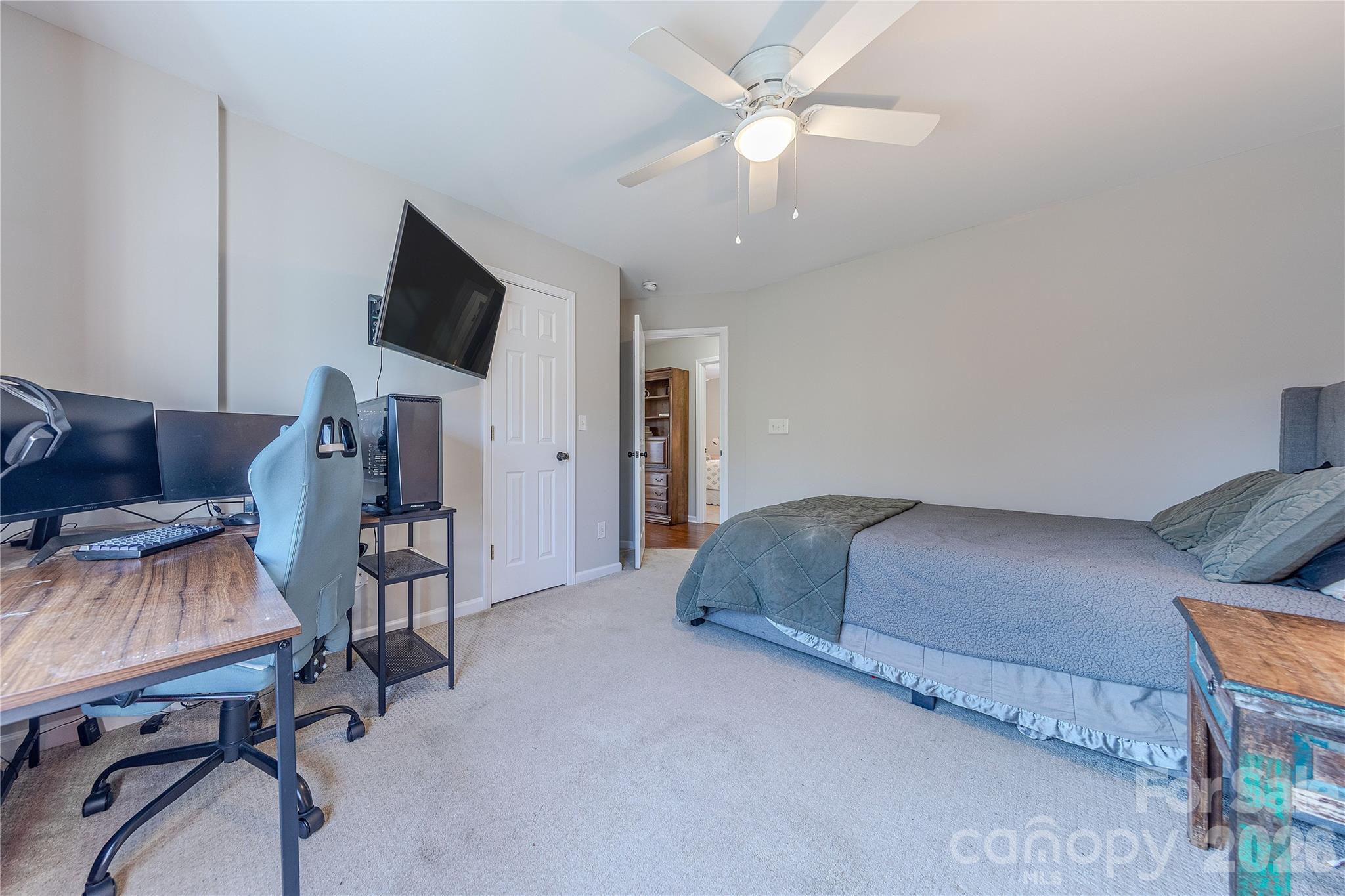 5919 Summer Fog End Fort Mill, SC 29708 - Photo 30 of 41 a living room with furniture and a flat screen tv