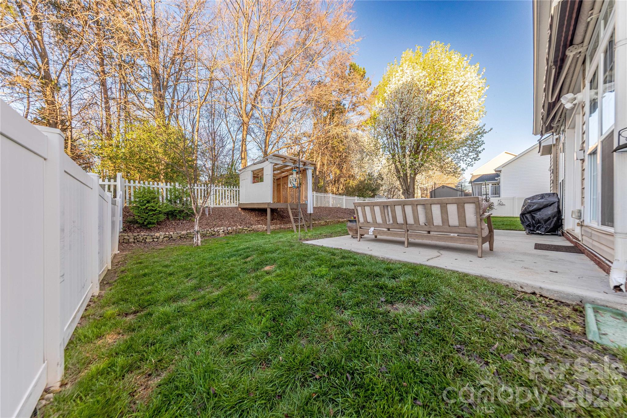 5919 Summer Fog End Fort Mill, SC 29708 - Photo 34 of 41 a view of a house with backyard and a tree