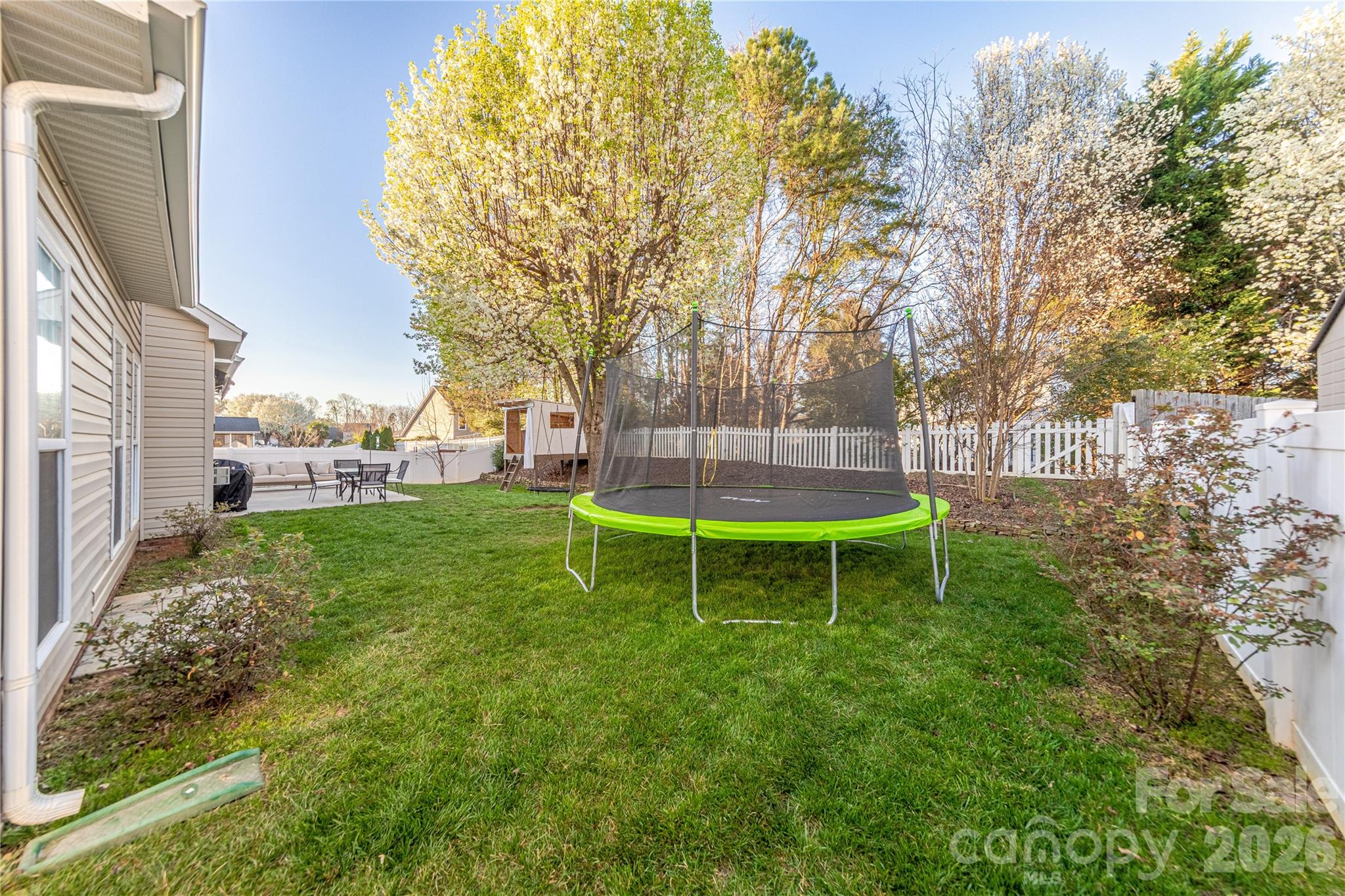 5919 Summer Fog End Fort Mill, SC 29708 - Photo 35 of 41 a view of a backyard with a garden and entertaining space