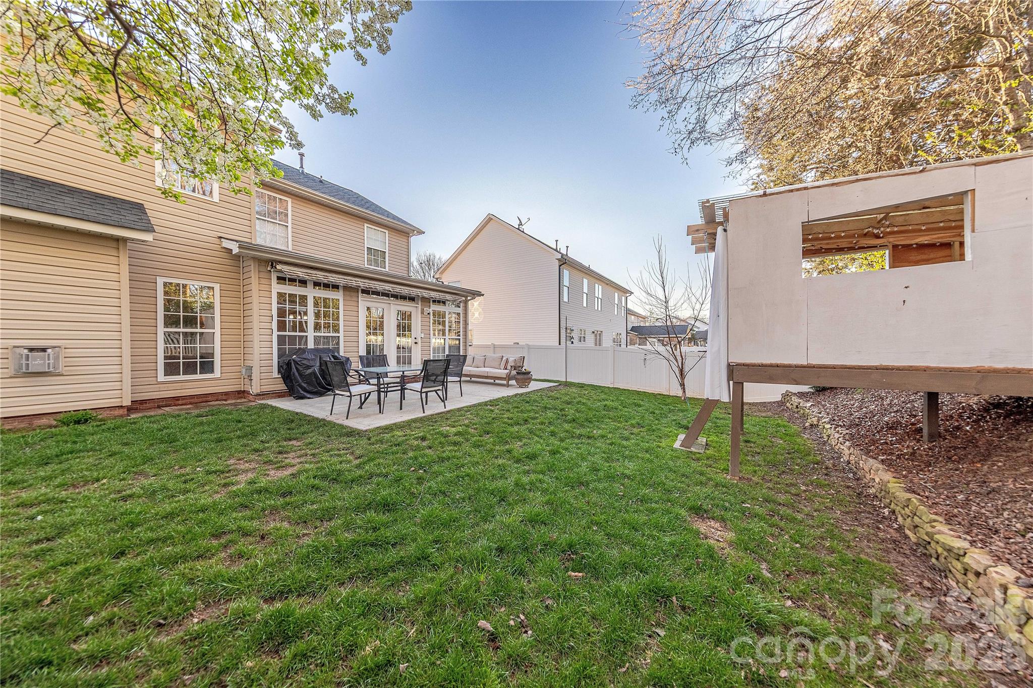 5919 Summer Fog End Fort Mill, SC 29708 - Photo 36 of 41 a view of a house with backyard and a tree