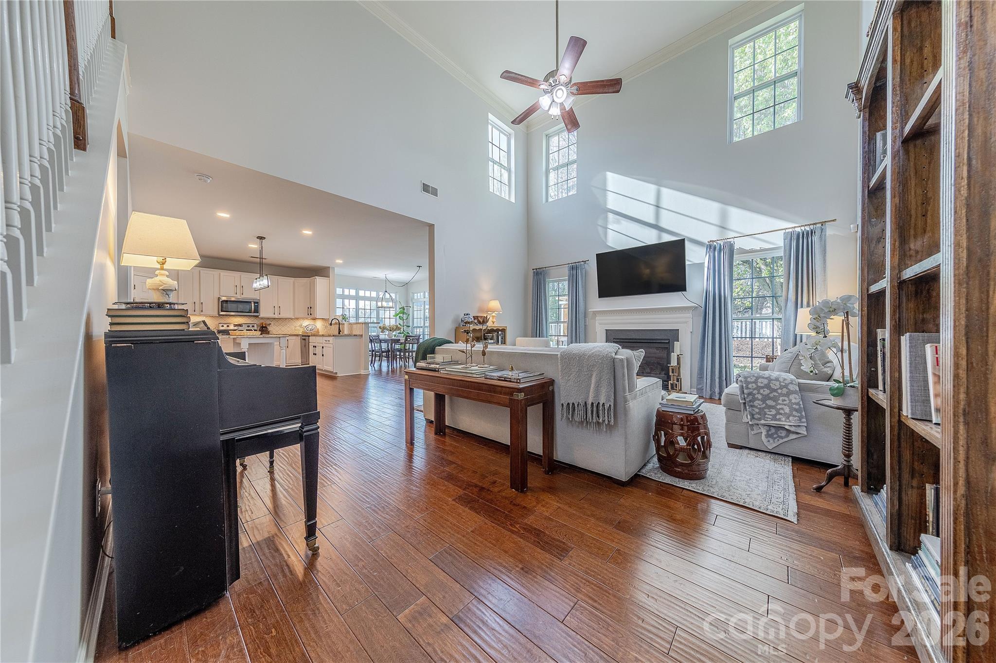 5919 Summer Fog End Fort Mill, SC 29708 - Photo 7 of 41 a living room with furniture wooden floor and a flat screen tv