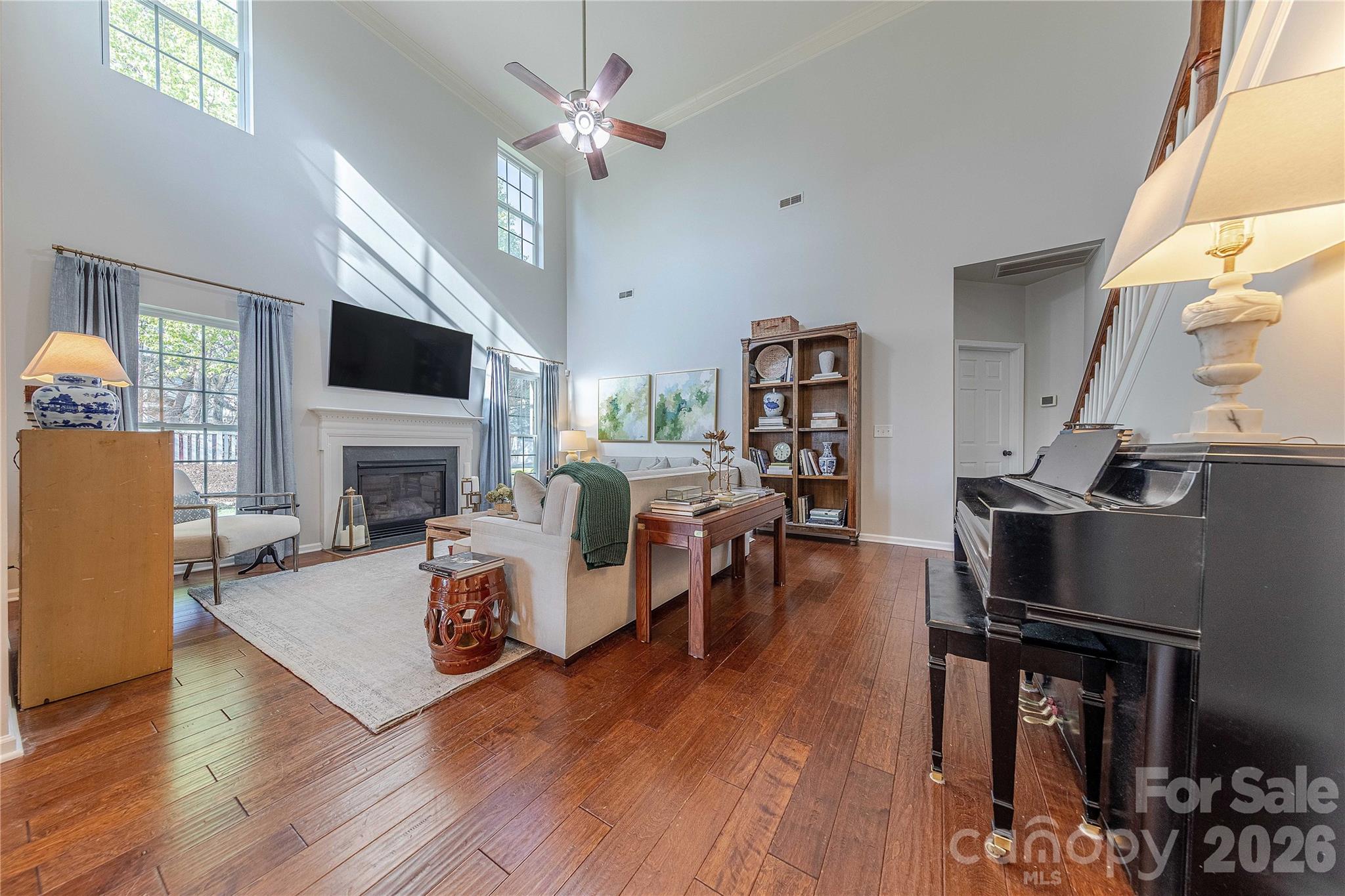 5919 Summer Fog End Fort Mill, SC 29708 - Photo 9 of 41 a living room with furniture fireplace and a flat screen tv