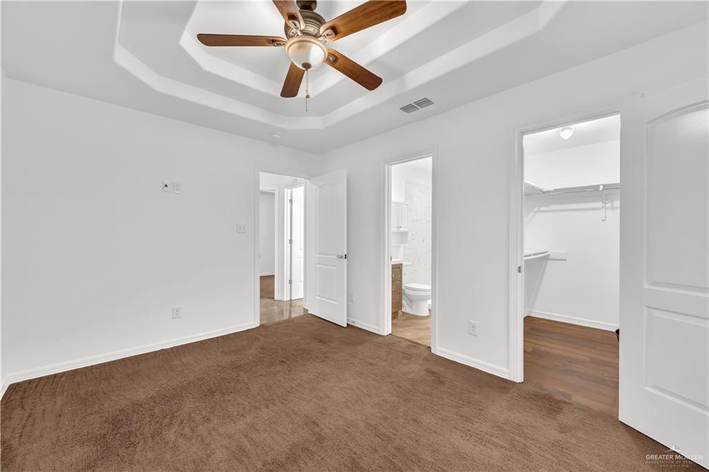 304 Santa Fe Street Alton, TX 78573 - Photo 13 of 31 wooden floor in an empty room
