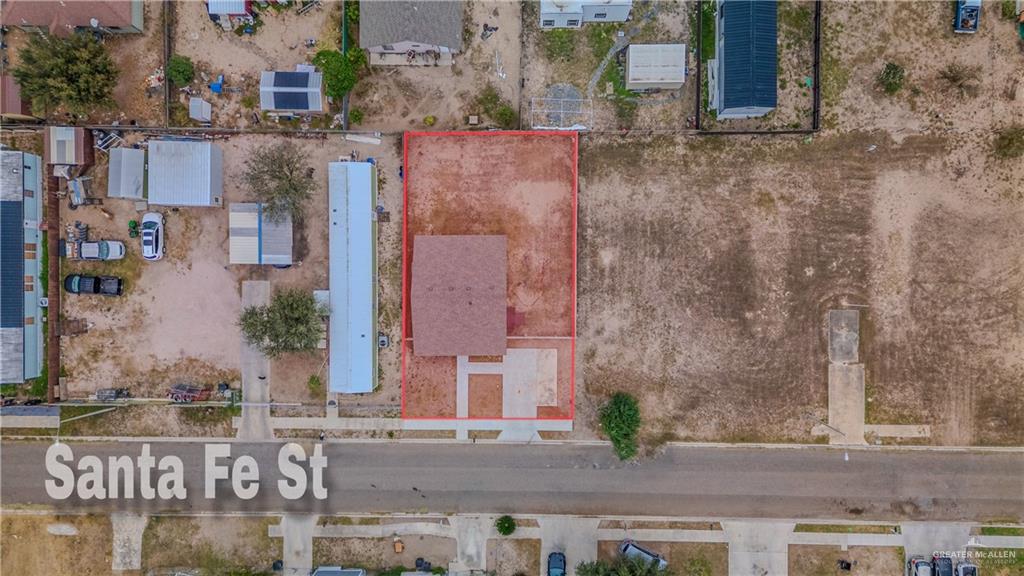 304 Santa Fe Street Alton, TX 78573 - Photo 23 of 31 front view of a brick building with an outdoor space