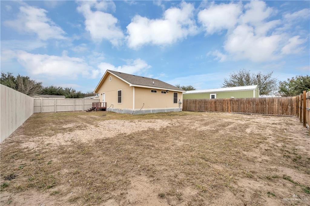 304 Santa Fe Street Alton, TX 78573 - Photo 5 of 31 a view of a house with a yard