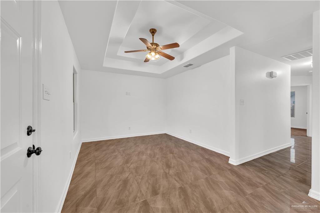 304 Santa Fe Street Alton, TX 78573 - Photo 8 of 31 wooden floor in an empty room