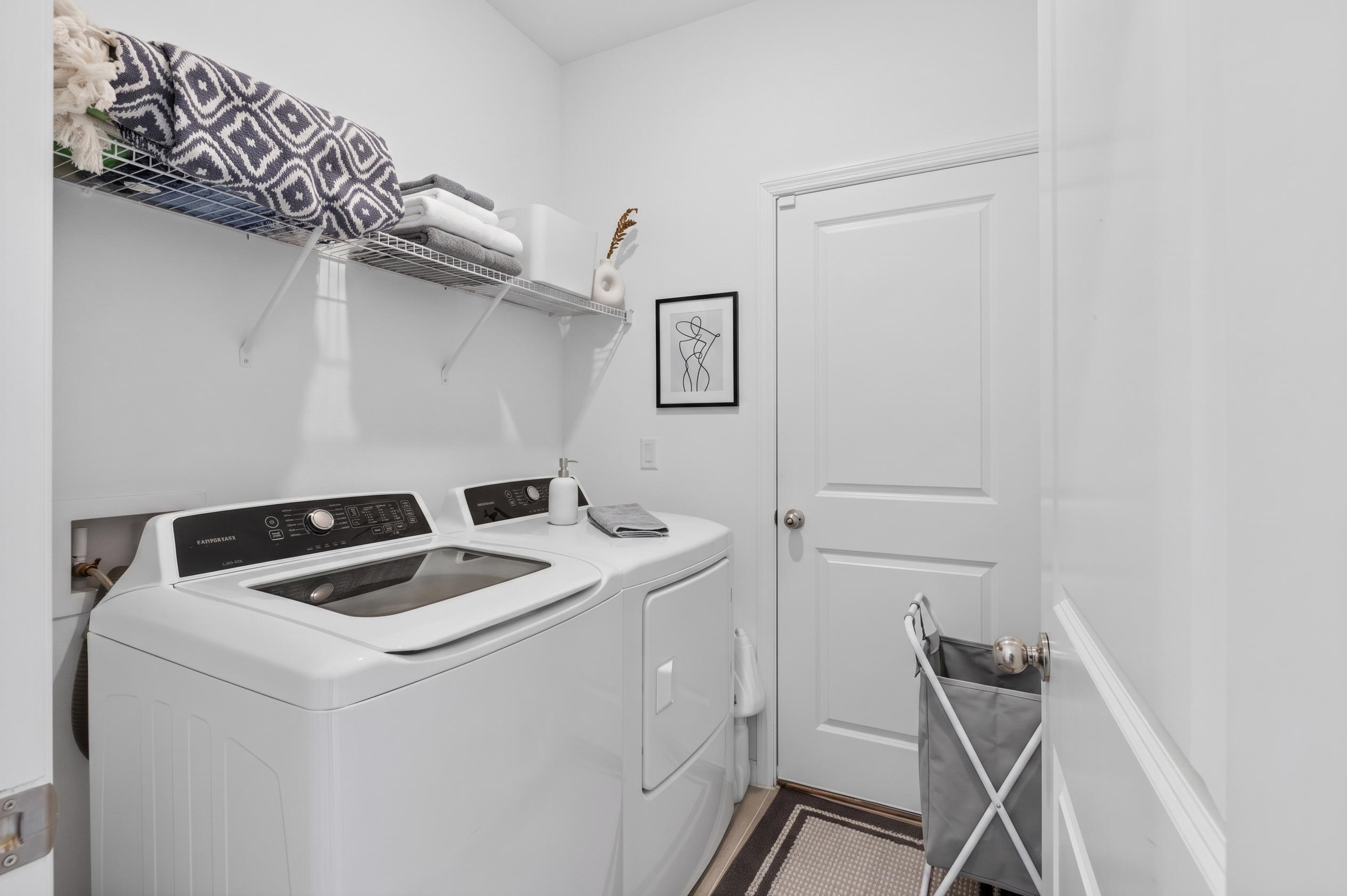 210 White Rabbit Run St. Augustine, FL 32092 - Photo 21 of 85 a utility room with dryer and washer