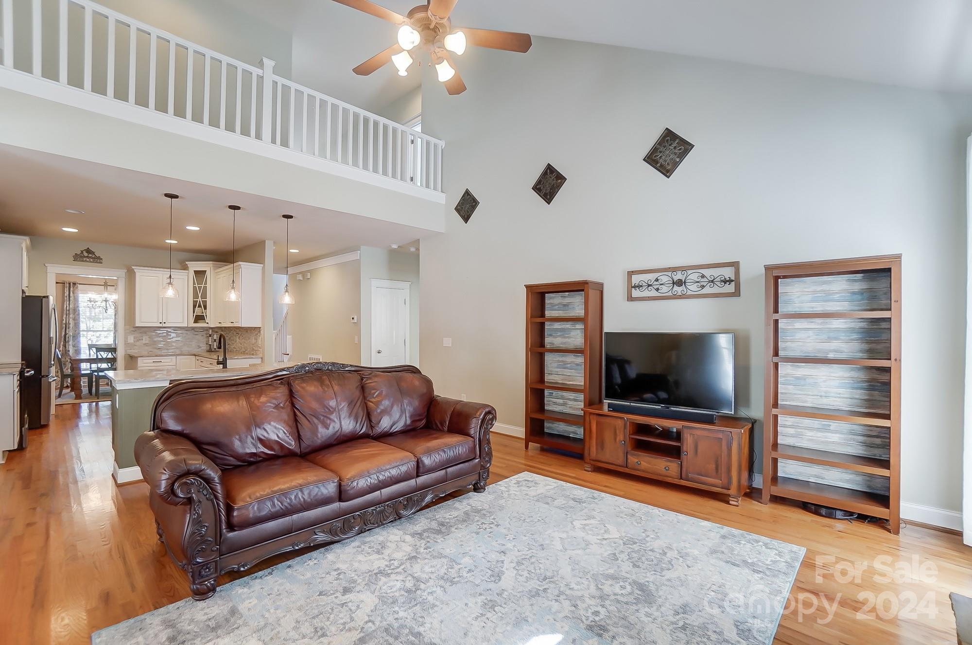169 Mills Lane Fort Mill, SC 29708 - Photo 13 of 38 a living room with furniture and a flat screen tv
