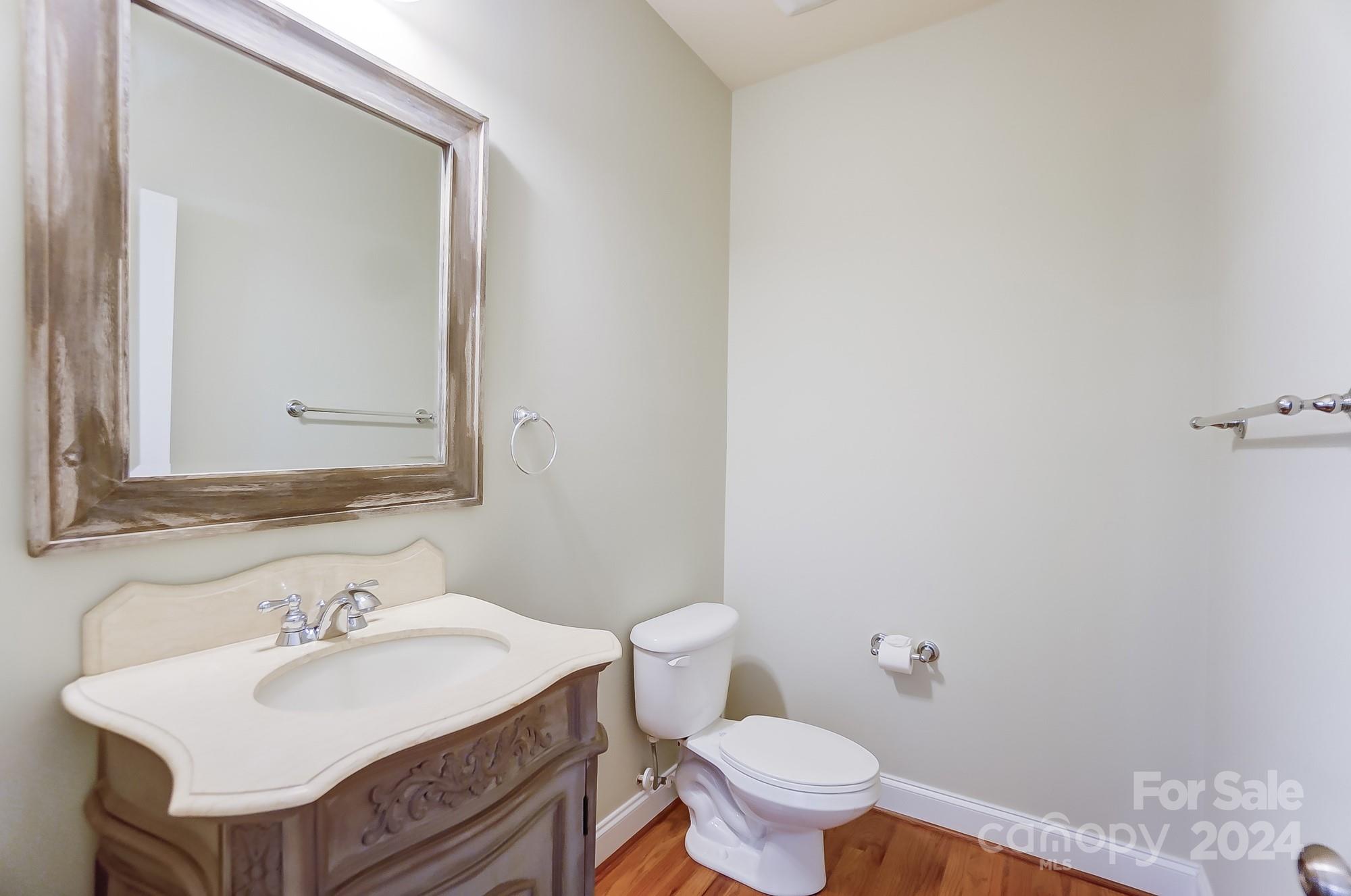 169 Mills Lane Fort Mill, SC 29708 - Photo 16 of 38 a bathroom with a sink and a toilet