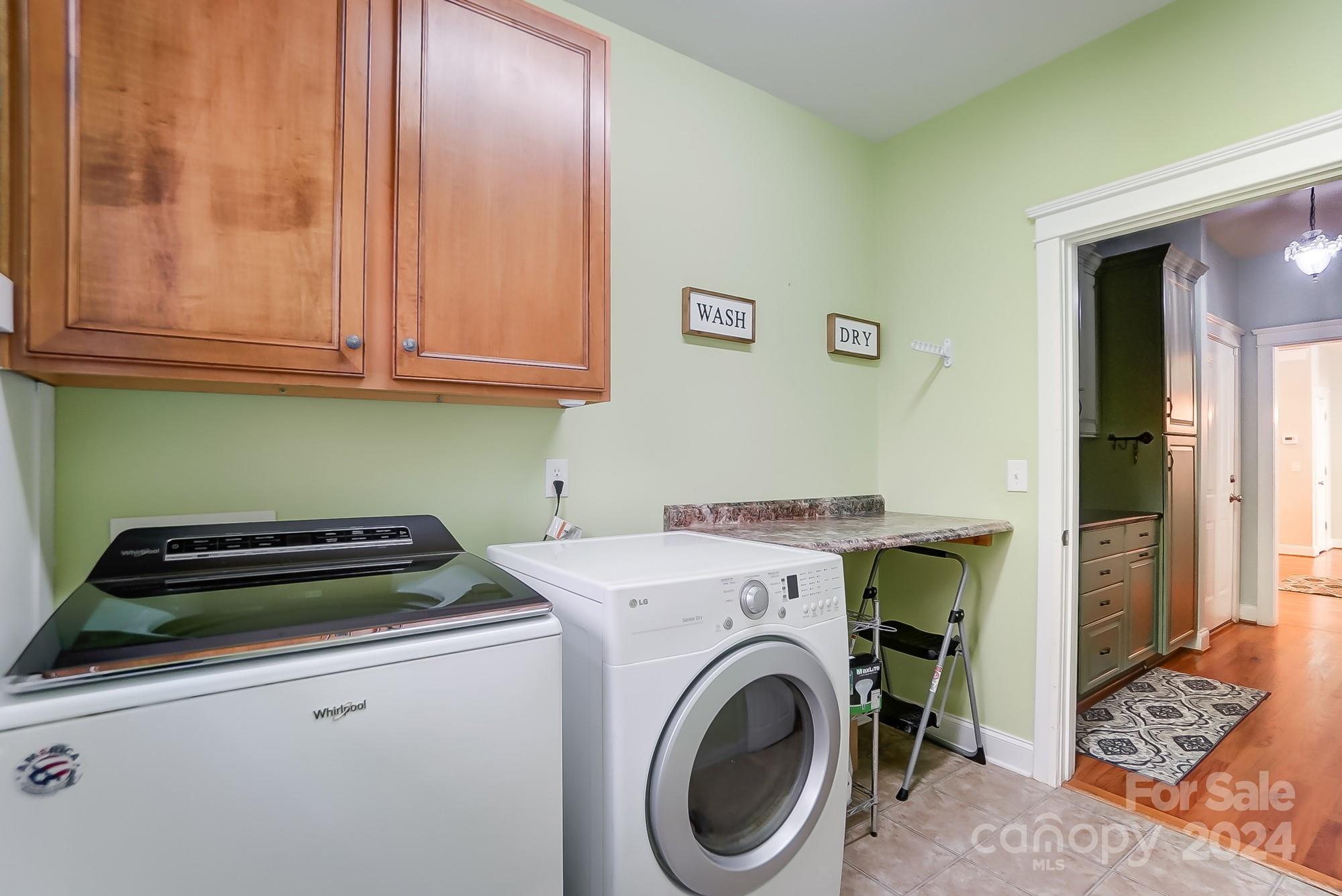 169 Mills Lane Fort Mill, SC 29708 - Photo 21 of 38 a utility room with dryer and washer