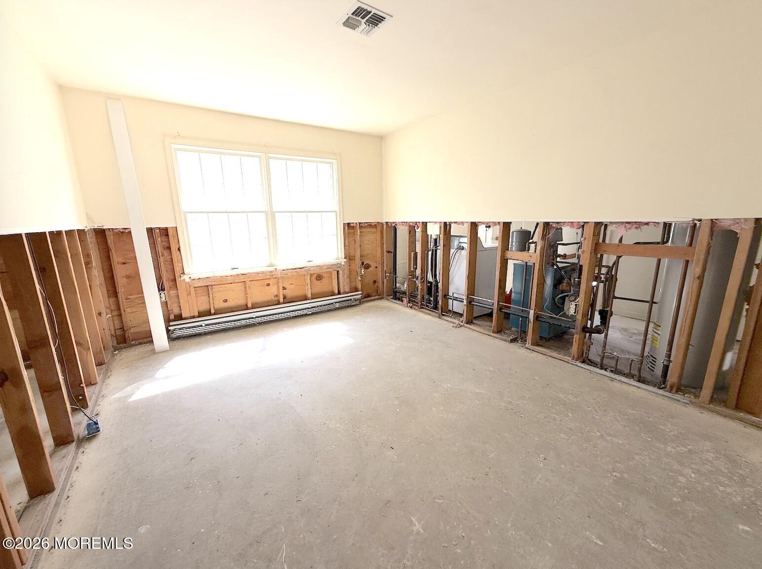 1575 Goldspire Road Toms River, NJ 08755 - Photo 13 of 16 an empty room with windows
