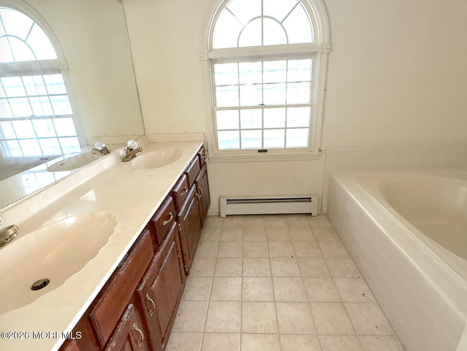 1575 Goldspire Road Toms River, NJ 08755 - Photo 3 of 16 a bathroom with a sink and a bathtub