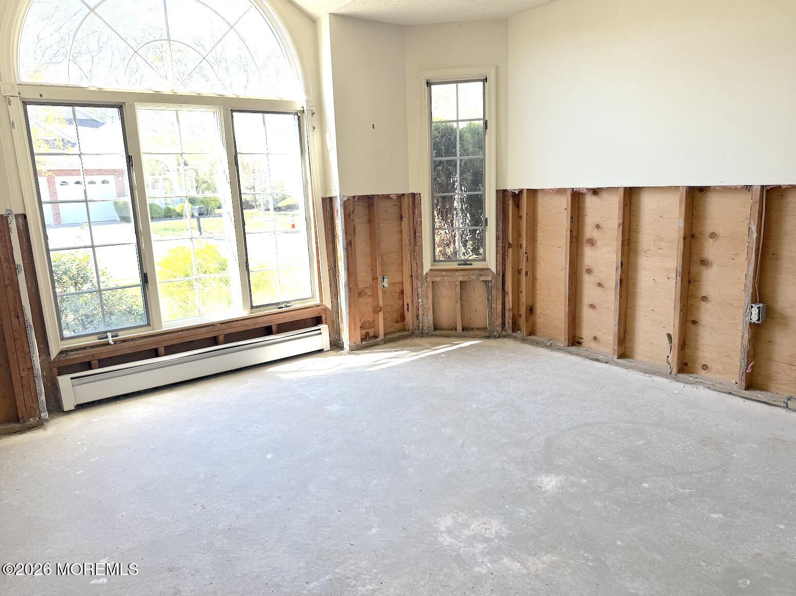 1575 Goldspire Road Toms River, NJ 08755 - Photo 4 of 16 a view of an empty room with a window