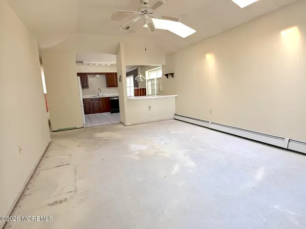 a view of a kitchen with a sink