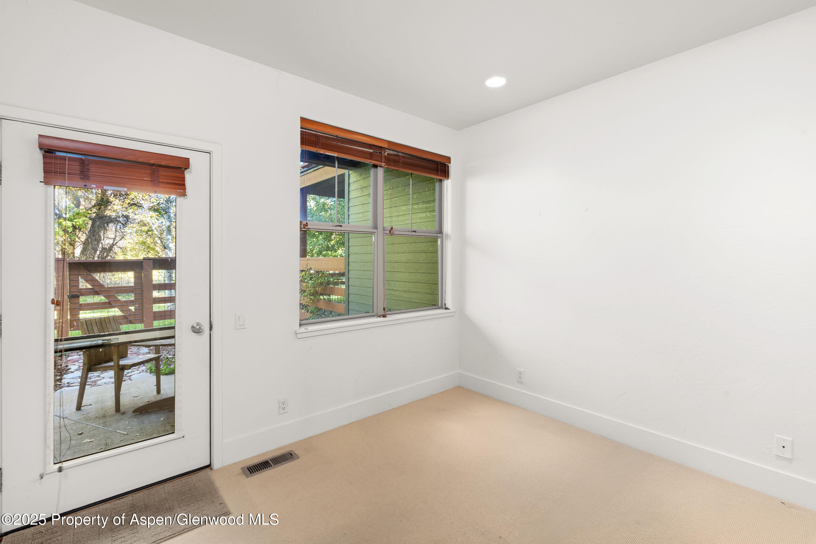 435 Jody Road Basalt, CO 81621 - Photo 17 of 29 an empty room with windows
