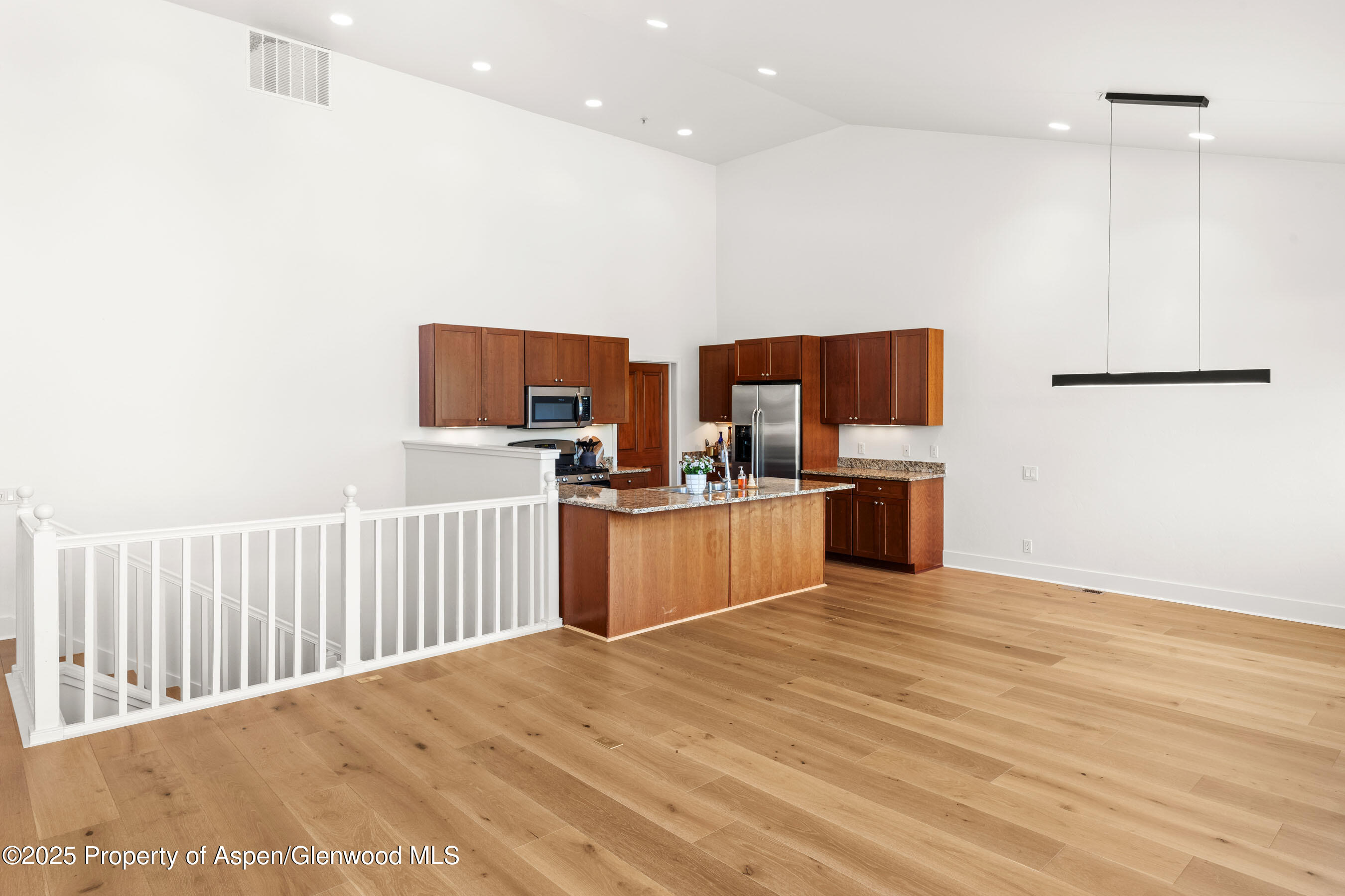 435 Jody Road Basalt, CO 81621 - Photo 7 of 29 a kitchen with stainless steel appliances a refrigerator and a microwave