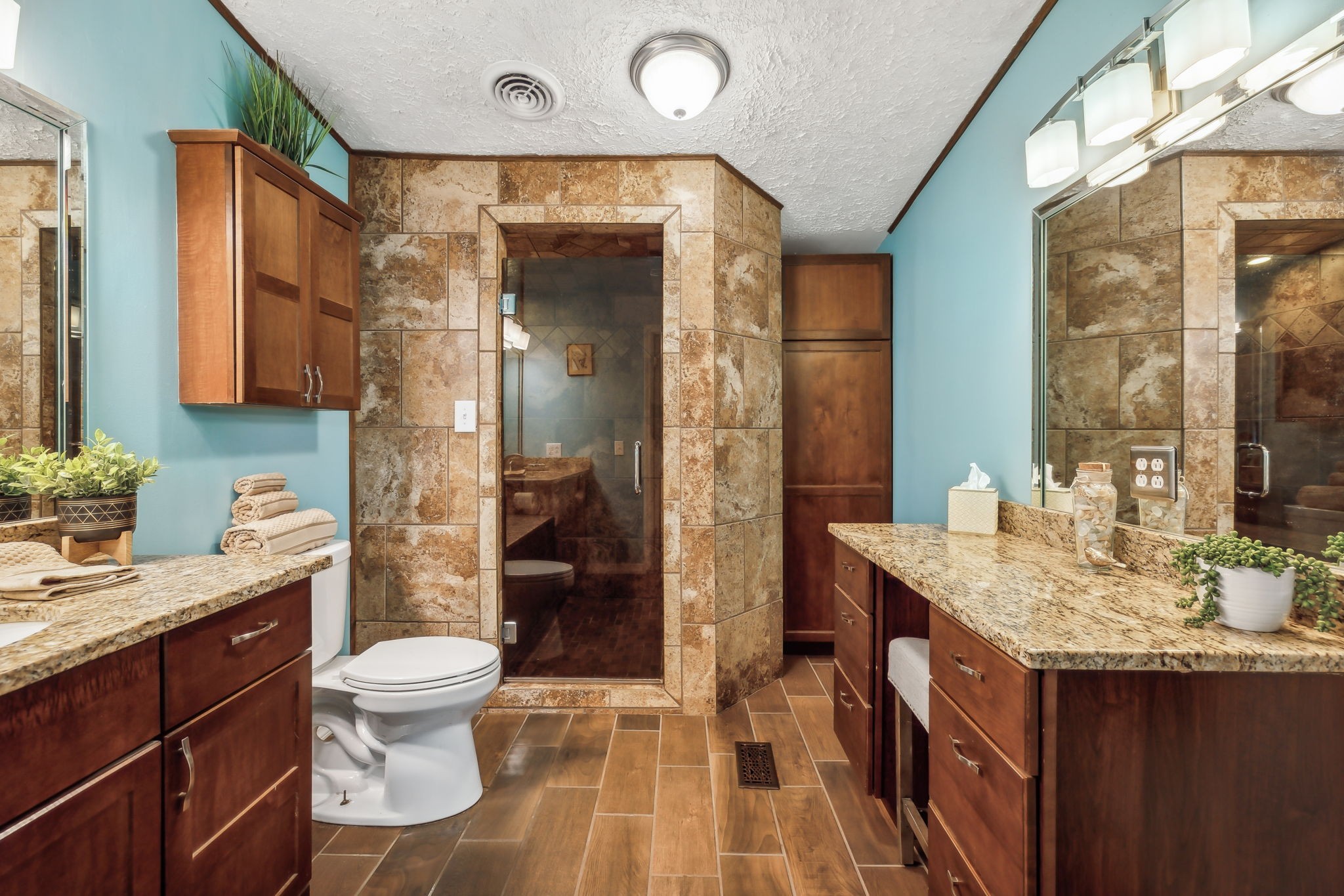2251 Phillips Road Lebanon, TN 37087 - Photo 21 of 41 a bathroom with a granite countertop sink a toilet a mirror and shower