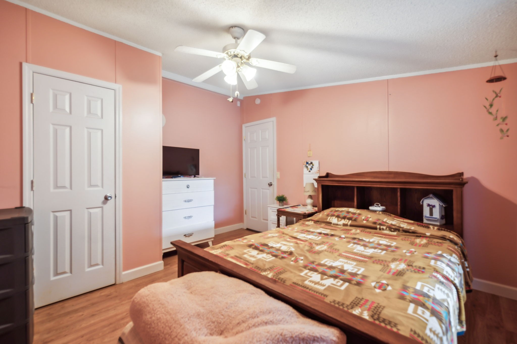 2251 Phillips Road Lebanon, TN 37087 - Photo 24 of 41 a bedroom with a bed and a chandelier