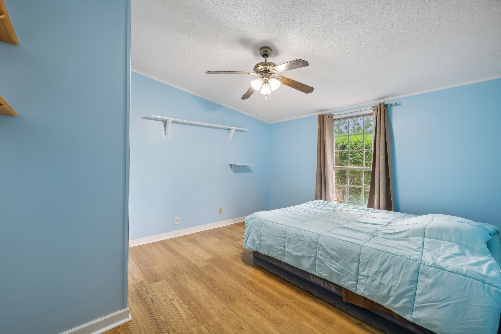 2251 Phillips Road Lebanon, TN 37087 - Photo 26 of 41 a bedroom with a bed and a window