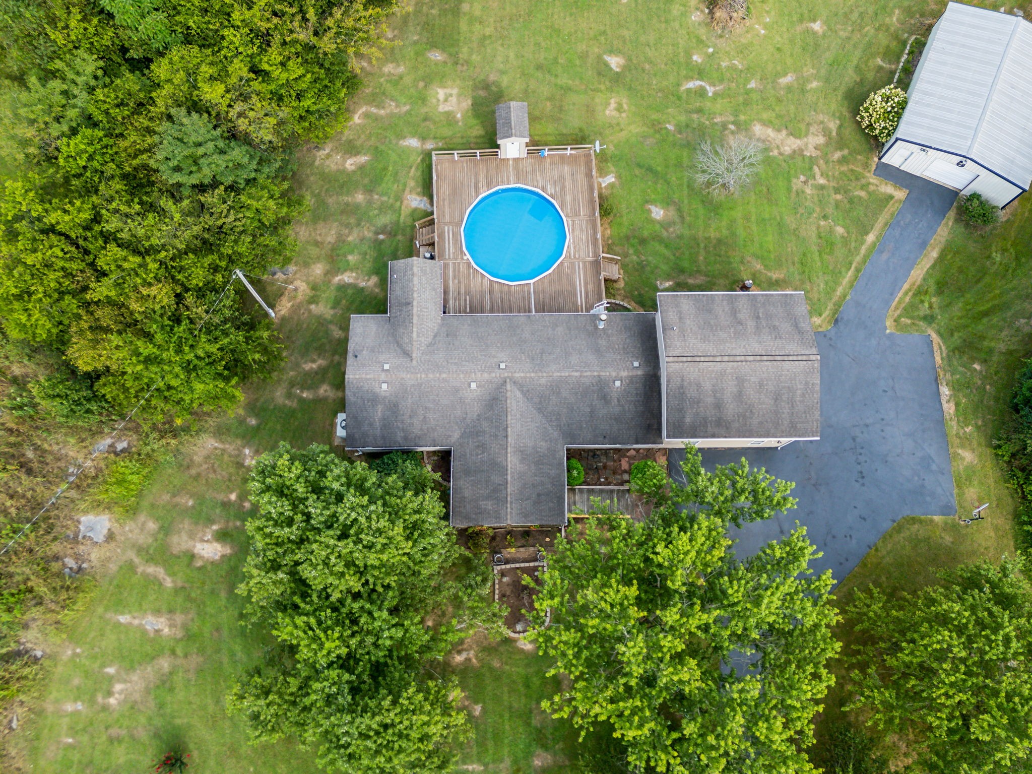2251 Phillips Road Lebanon, TN 37087 - Photo 3 of 41 an aerial view of a house with a yard and garden