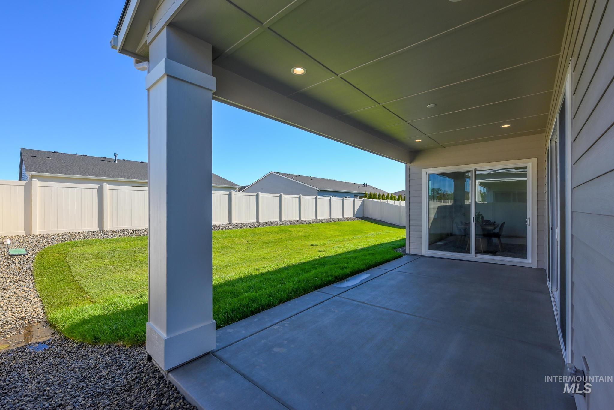 9074 West Moonglade Street Star, ID 83669 - Photo 28 of 40 Covered concrete patio with recessed lighting and siding exterior