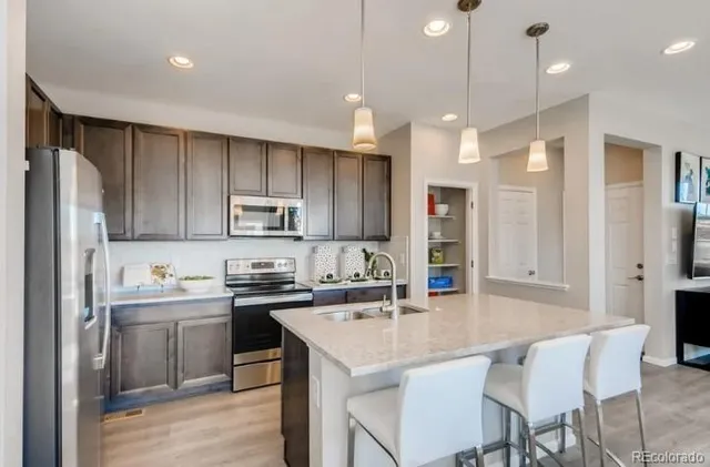 a view of a bathroom from a hallway