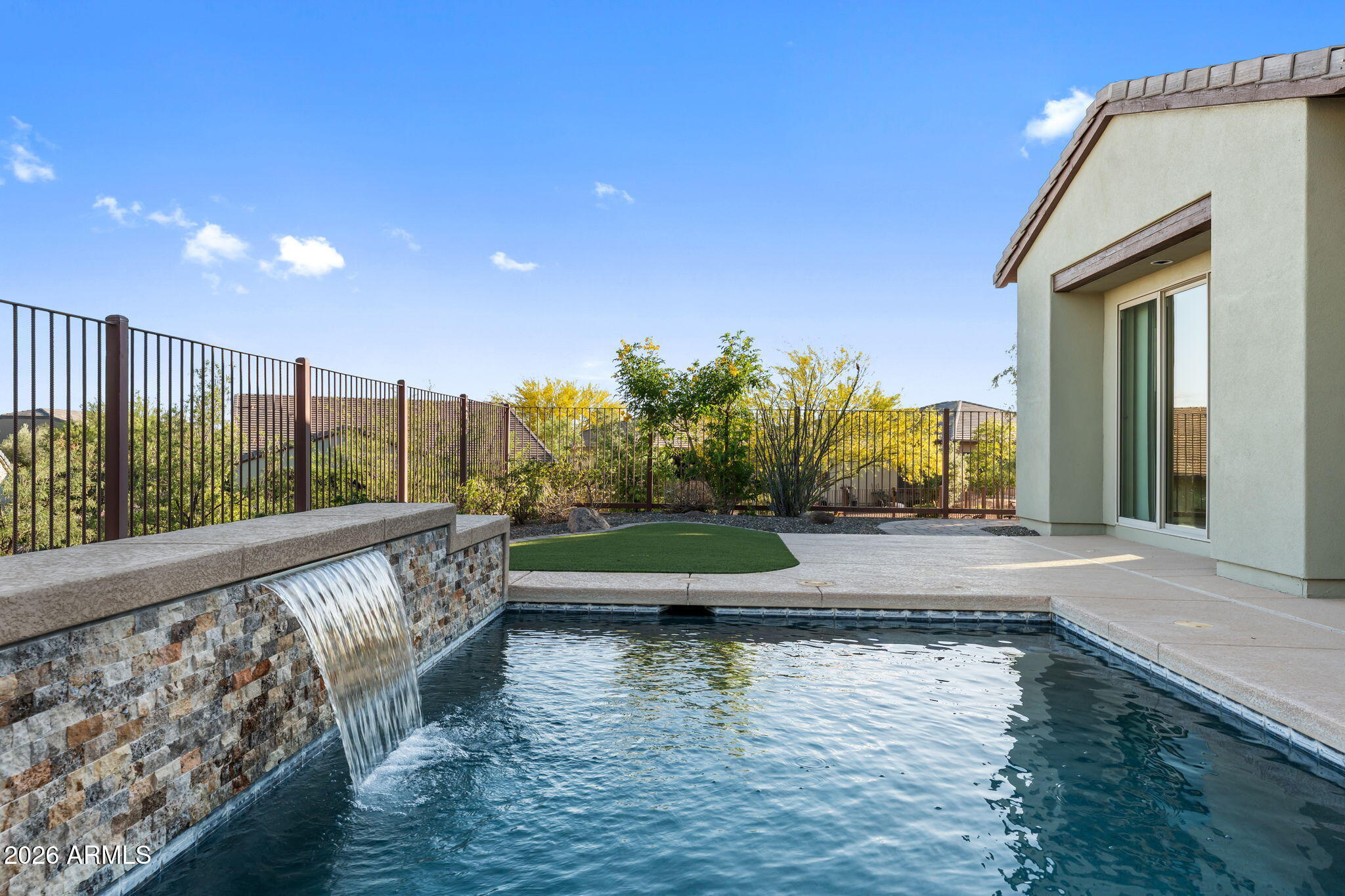 3675 Gold Ridge Road Wickenburg, AZ 85390 - Photo 37 of 58 a view of a house with a ocean view