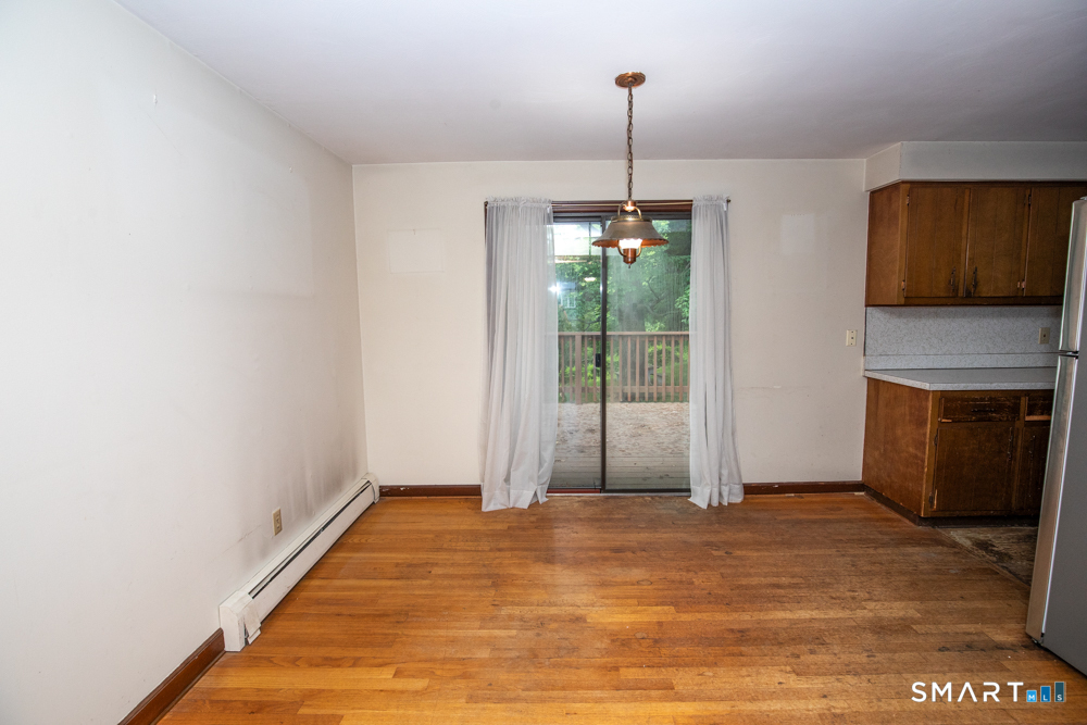 64 Somer Drive Meriden, CT 06451 - Photo 9 of 28 a view of an empty room with a window
