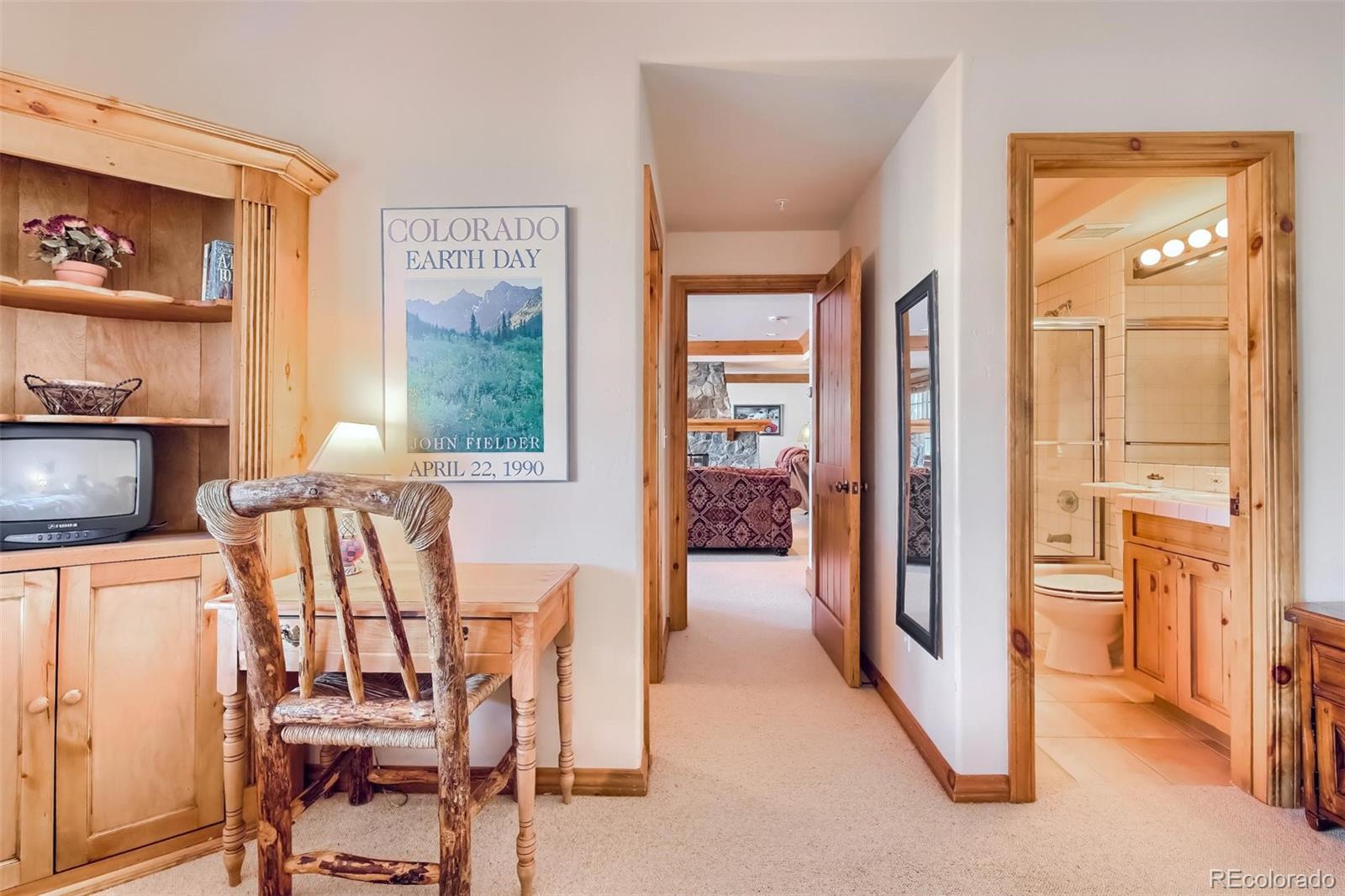 5 Fairway Lane Edwards, CO 81632 - Photo 15 of 34 a view of a dining room with furniture and a chandelier