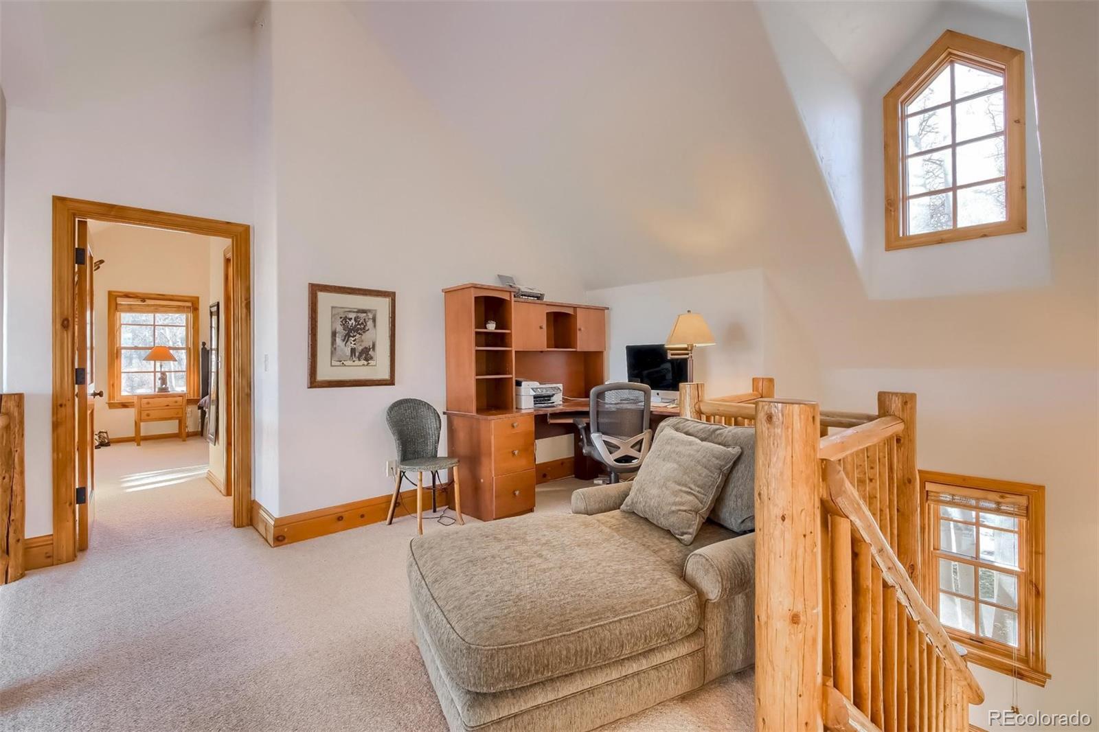 5 Fairway Lane Edwards, CO 81632 - Photo 20 of 34 a living room with furniture and a window