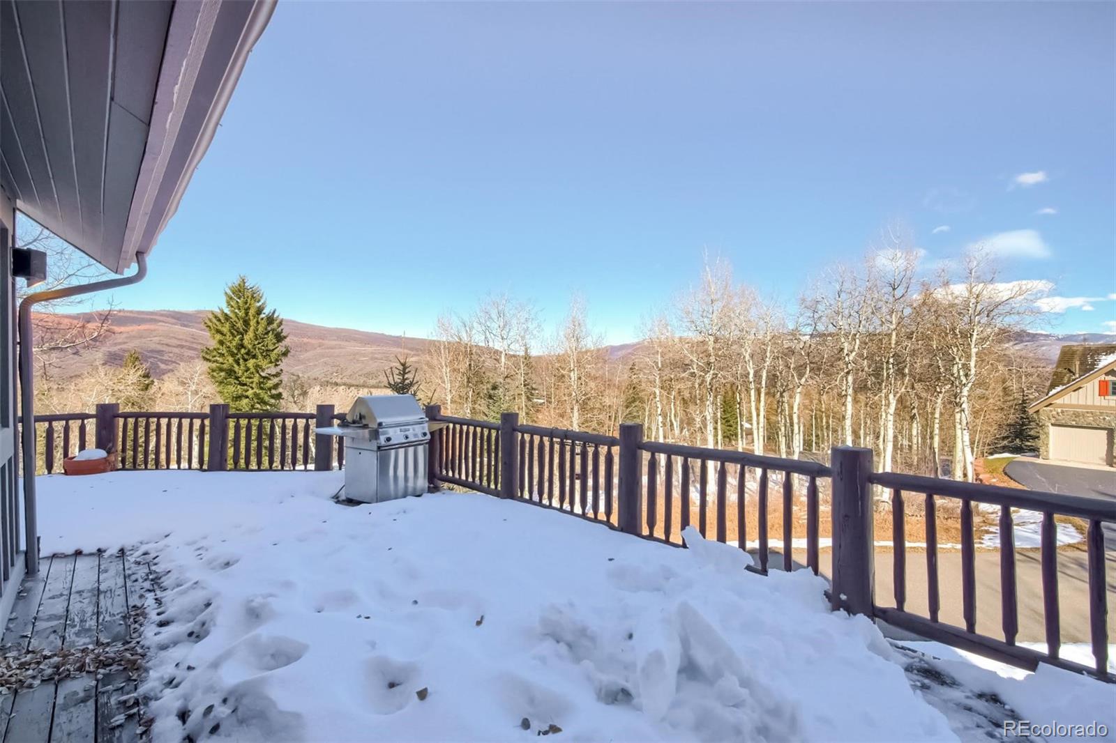 5 Fairway Lane Edwards, CO 81632 - Photo 25 of 34 a view of a balcony with wooden fence