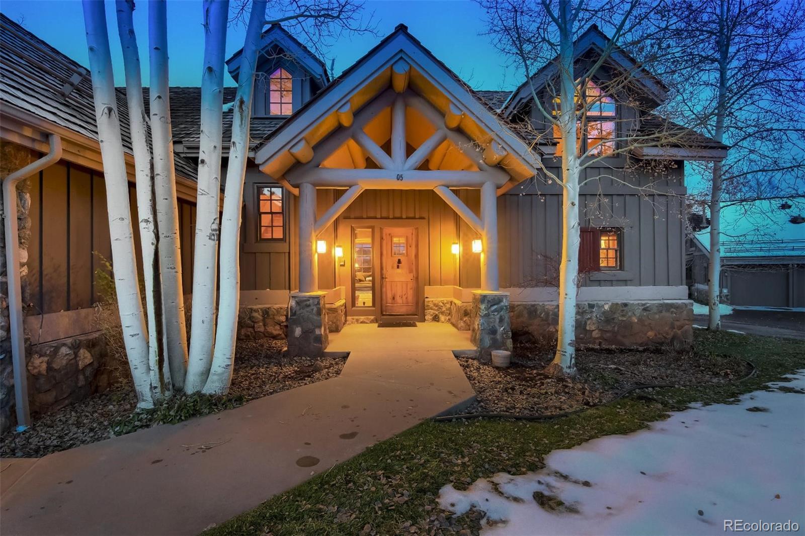 5 Fairway Lane Edwards, CO 81632 - Photo 31 of 34 a front view of a house with garden