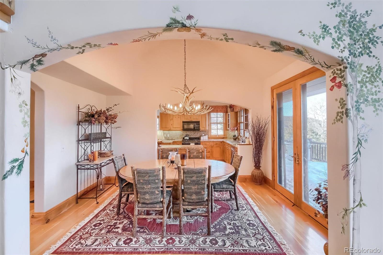 5 Fairway Lane Edwards, CO 81632 - Photo 9 of 34 a dining room with furniture window and wooden floor