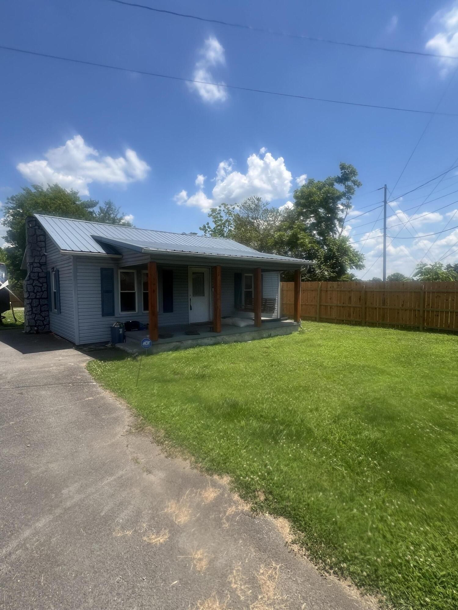 805 Durkee Road Cleveland, TN 37323 - Photo 2 of 26 a view of a house with a yard
