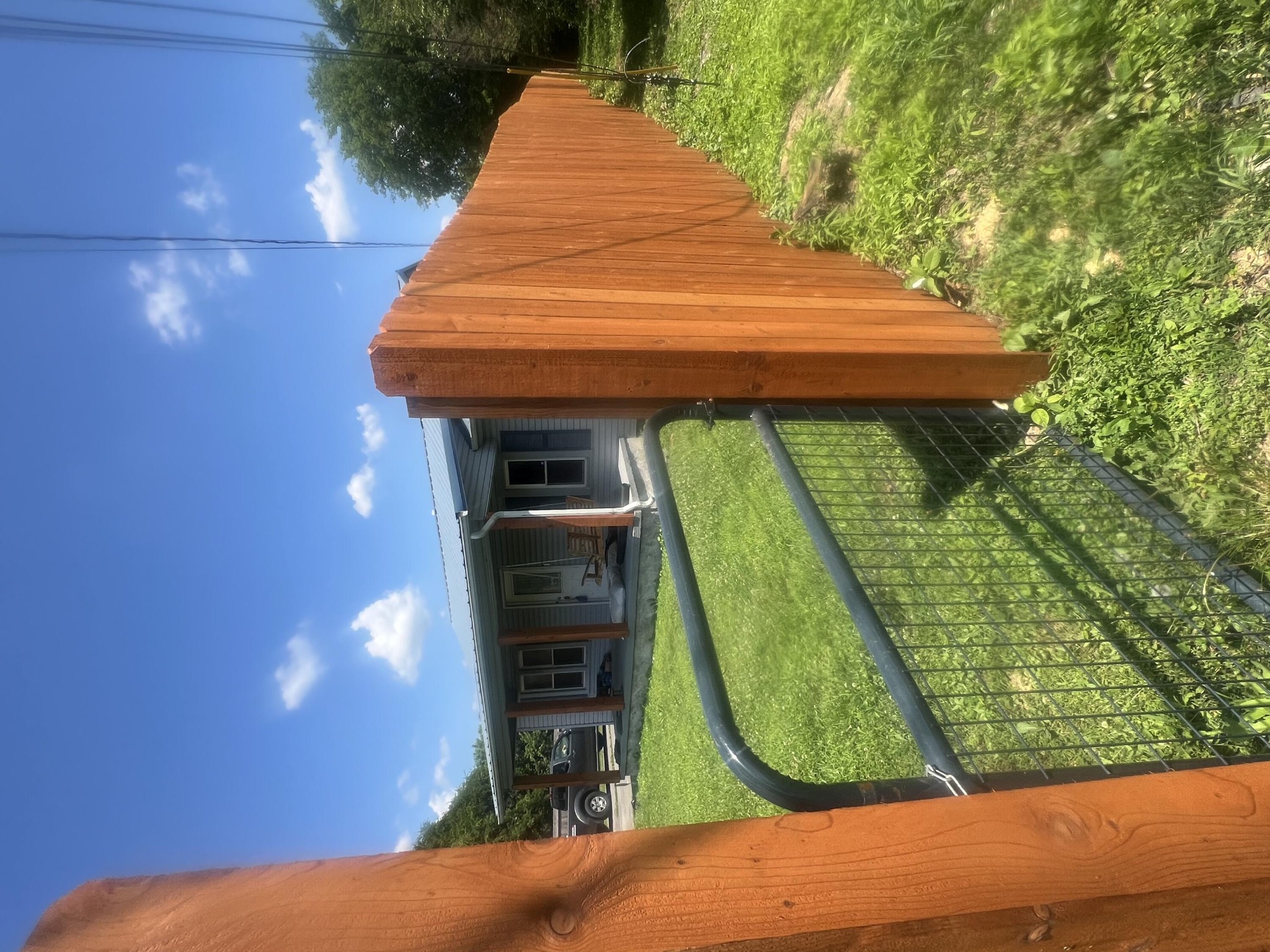805 Durkee Road Cleveland, TN 37323 - Photo 26 of 26 a view of a backyard with plants and a swing