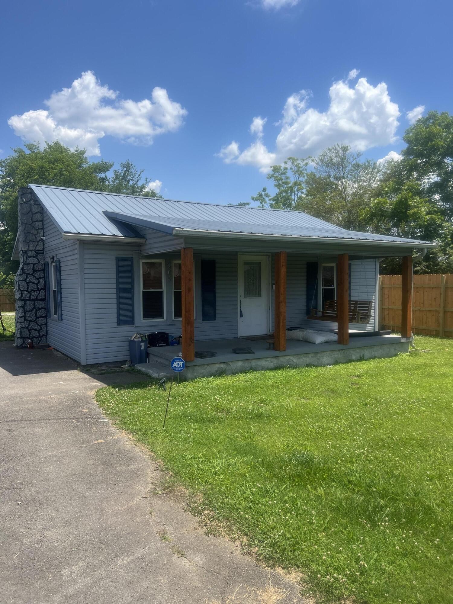805 Durkee Road Cleveland, TN 37323 - Photo 3 of 26 a view of a house with backyard porch and garden