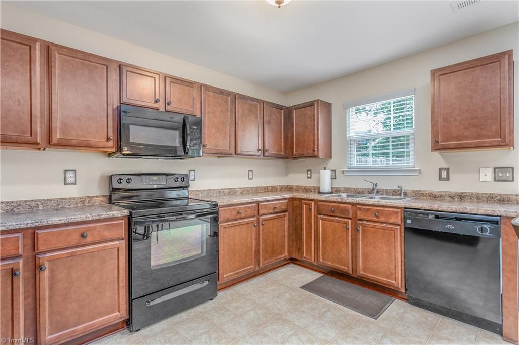 6609 Tromble Road Whitsett, NC 27377 - Photo 11 of 31